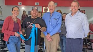 Arnie’s Drive In celebrates grand opening with ribbon-tying ceremony